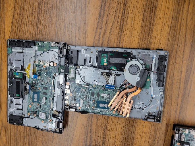 Chromebook disassembly image (with CPU heatsinks on top of Chromebook).